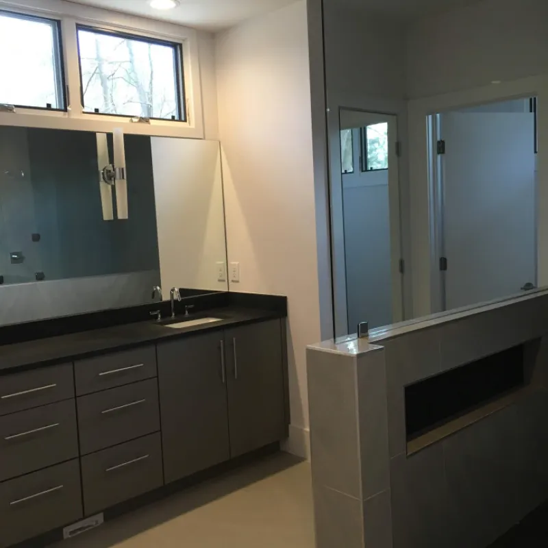 a kitchen with a sink and cabinets