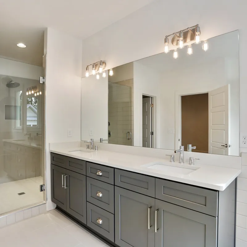 a bathroom with a large mirror