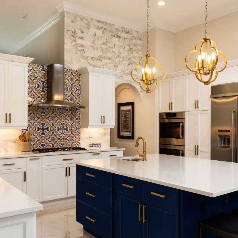 a kitchen with white cabinets