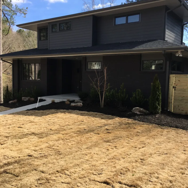 a house with a dirt yard