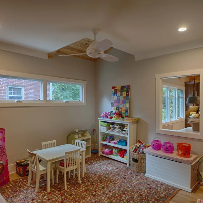 a room with a table and chairs