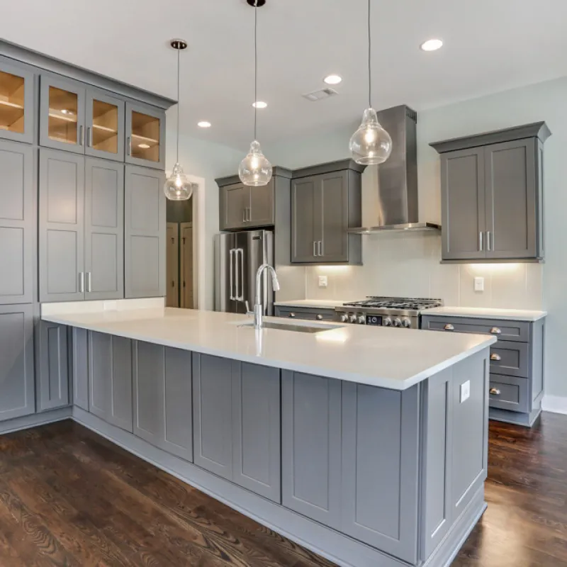 a kitchen with white cabinets