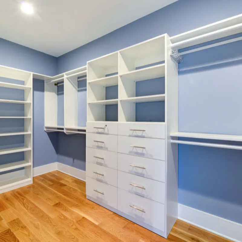 a room with white cabinets