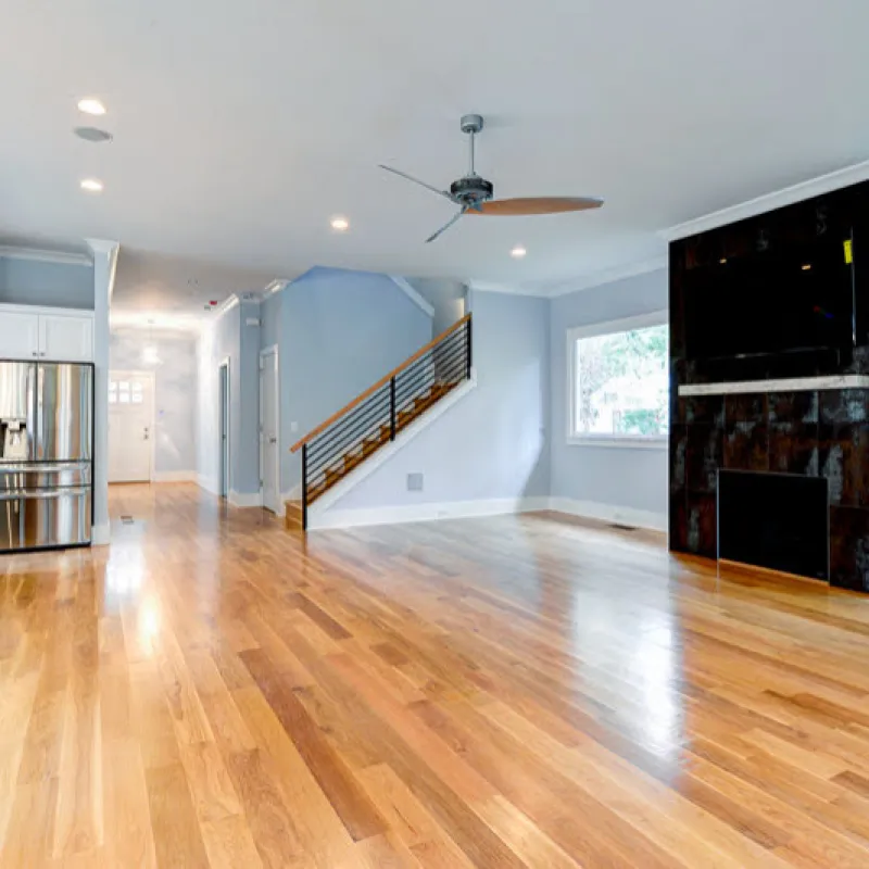 a large living room with a wood floor
