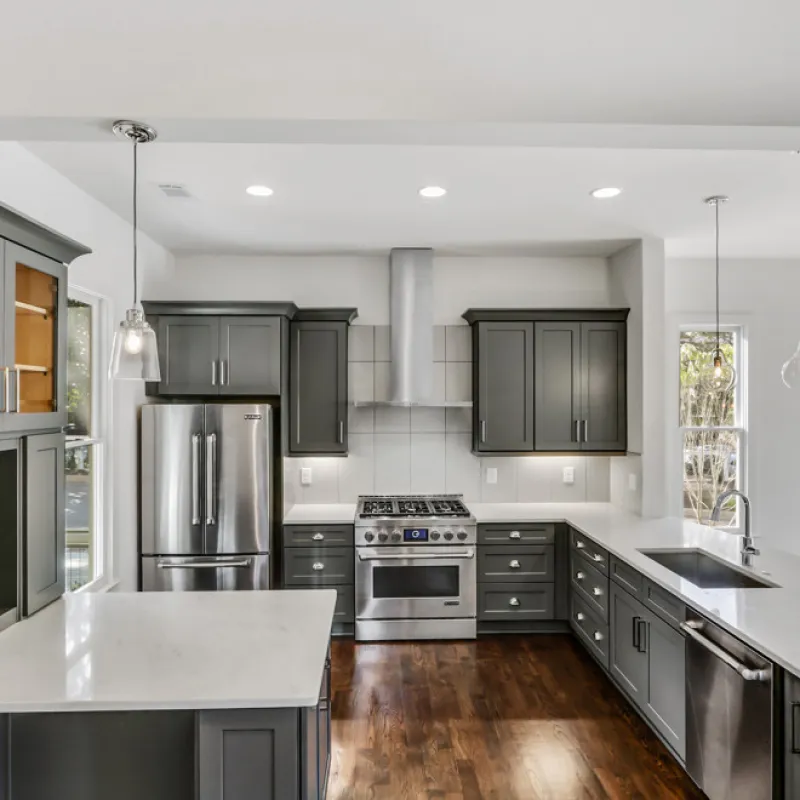 a kitchen with stainless steel appliances