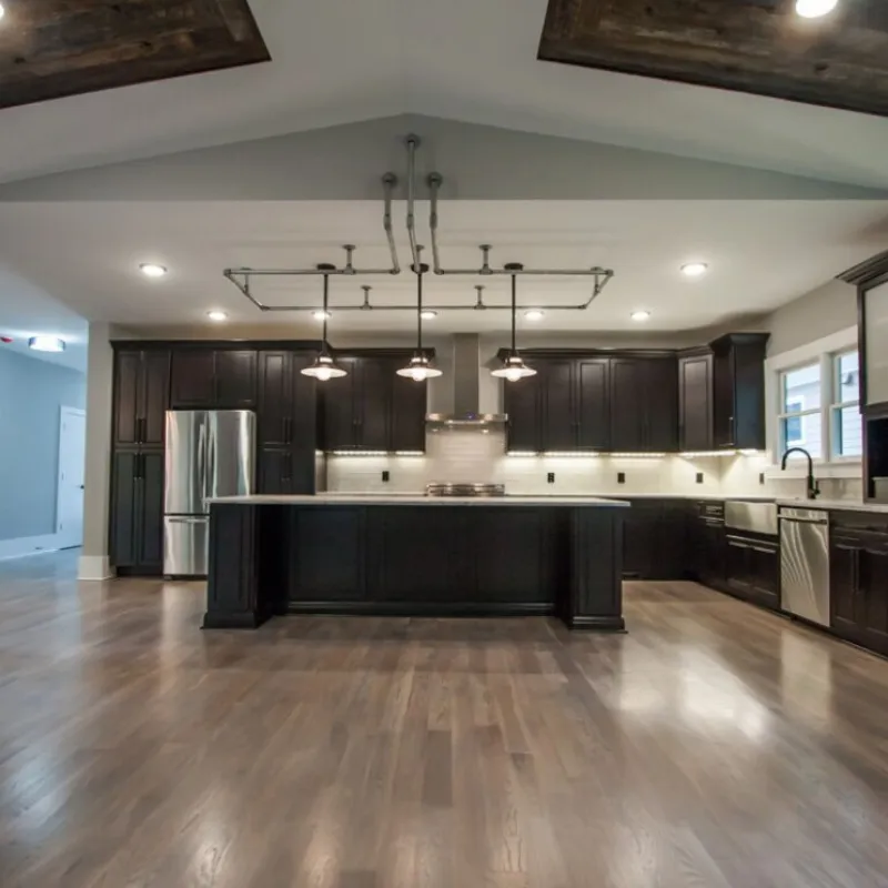 a kitchen with a wood floor