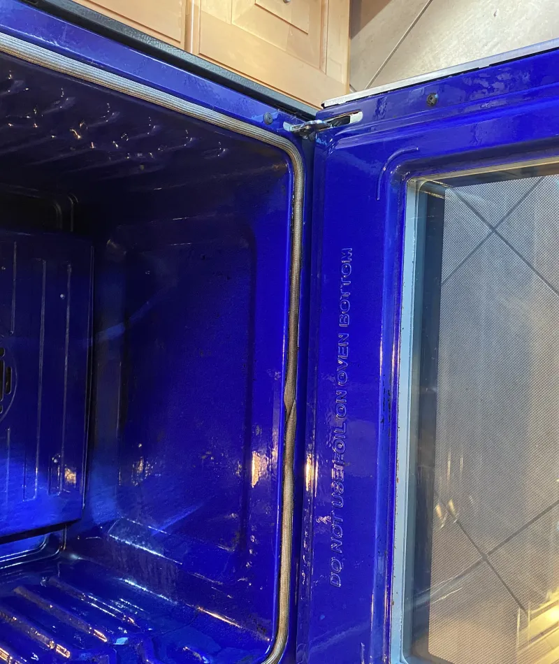 a blue oven that has been completely cleaned by MaidPro Salem