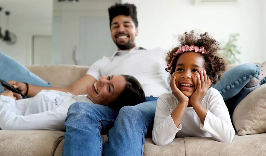 a group of people sitting on a couch