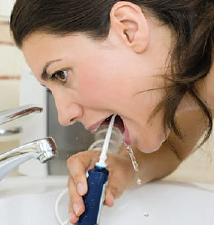 Is Traditional Flossing too Difficult? Consider Water Flossing
