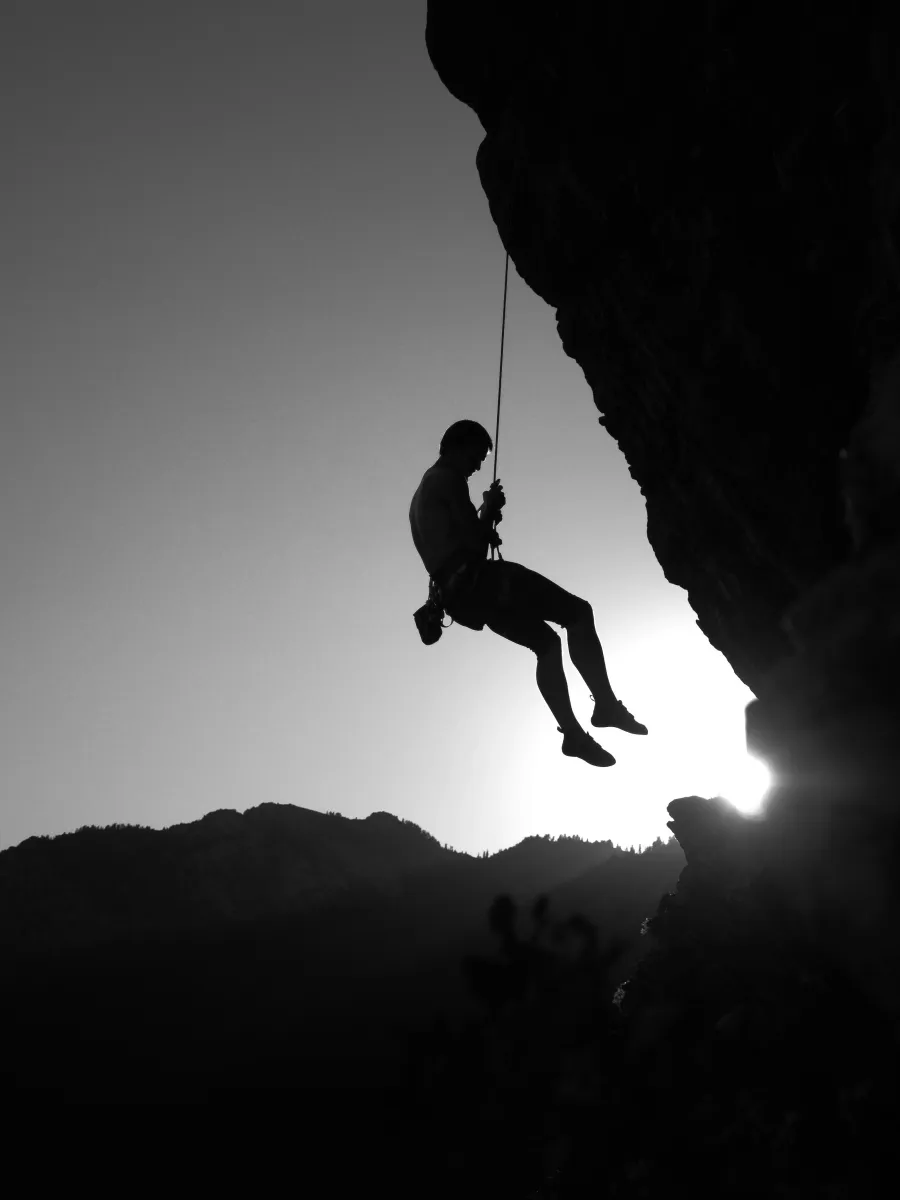a man rock climbing