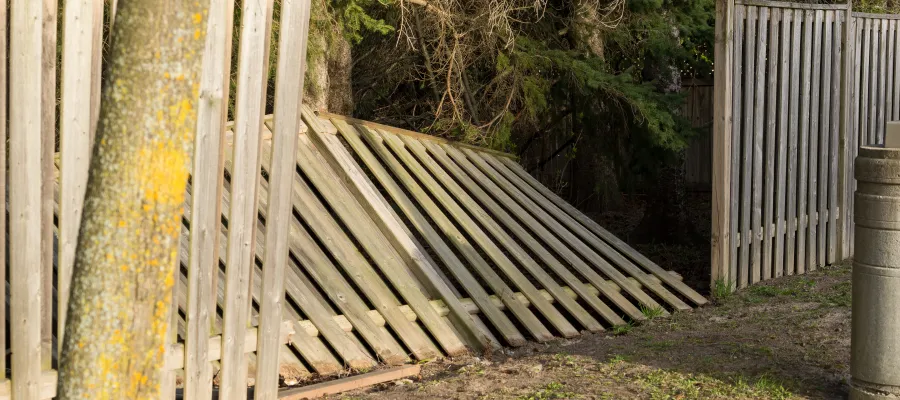 a wooden fence with a wooden gate