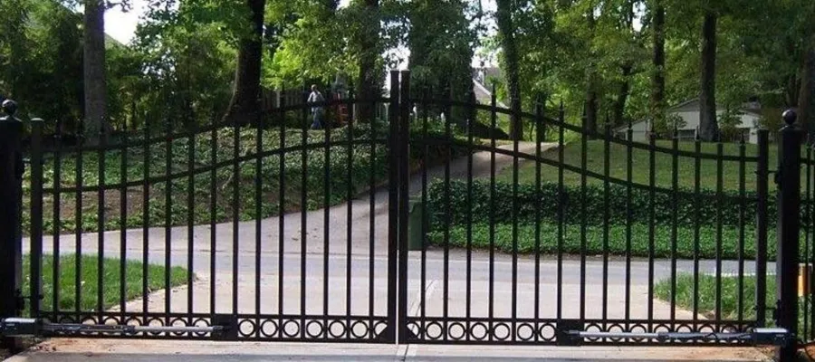 a gate with trees in the background