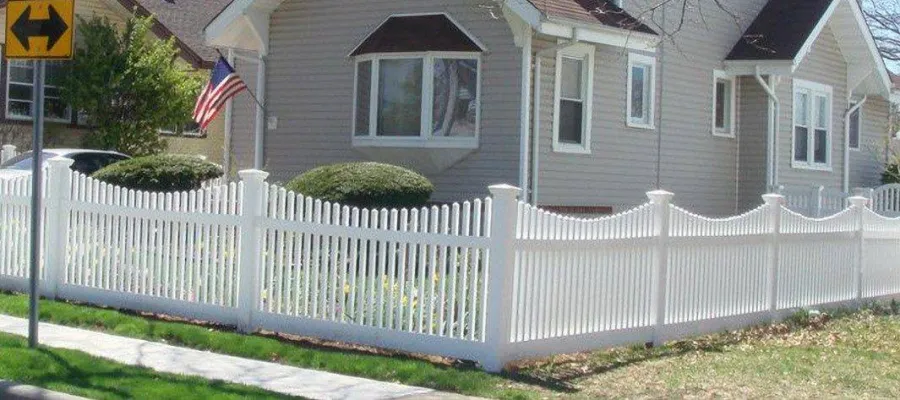 a house with a white picket fence