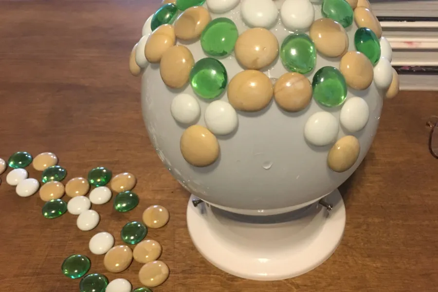 stones on a globe mosiac