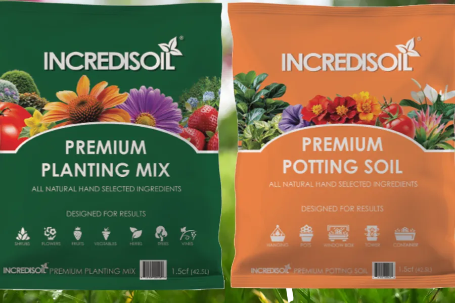 Bags of Incredisoil Premium Planting Mix and Premium Potting Soil with colorful flowers and vegetables on packaging.
