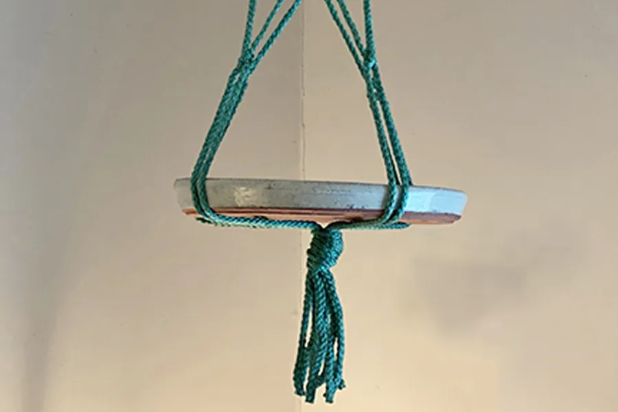 Plant saucer into macrame planter