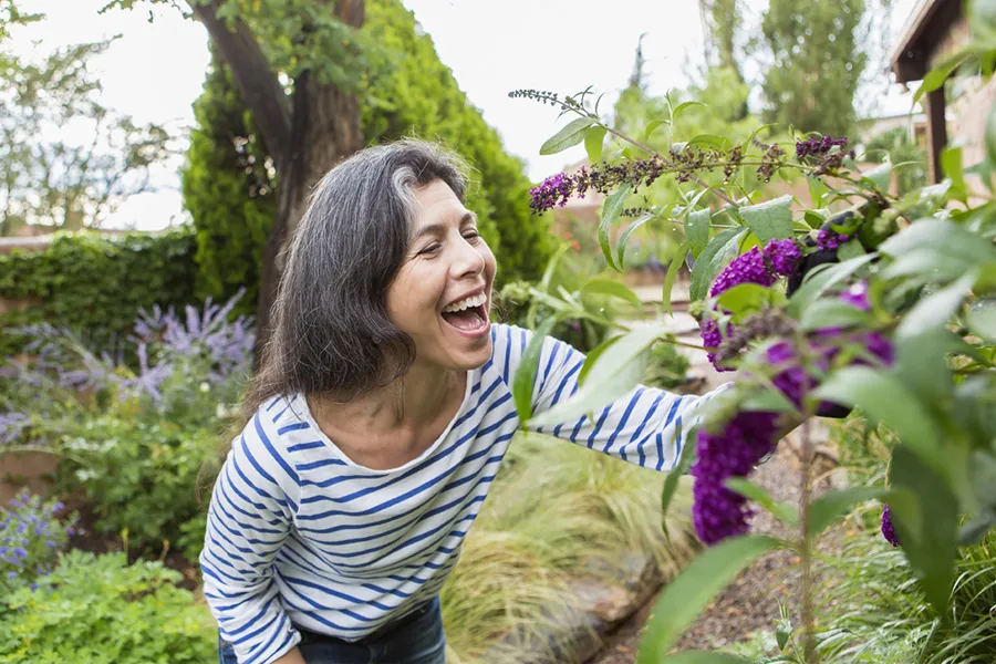 a person standing in a garden