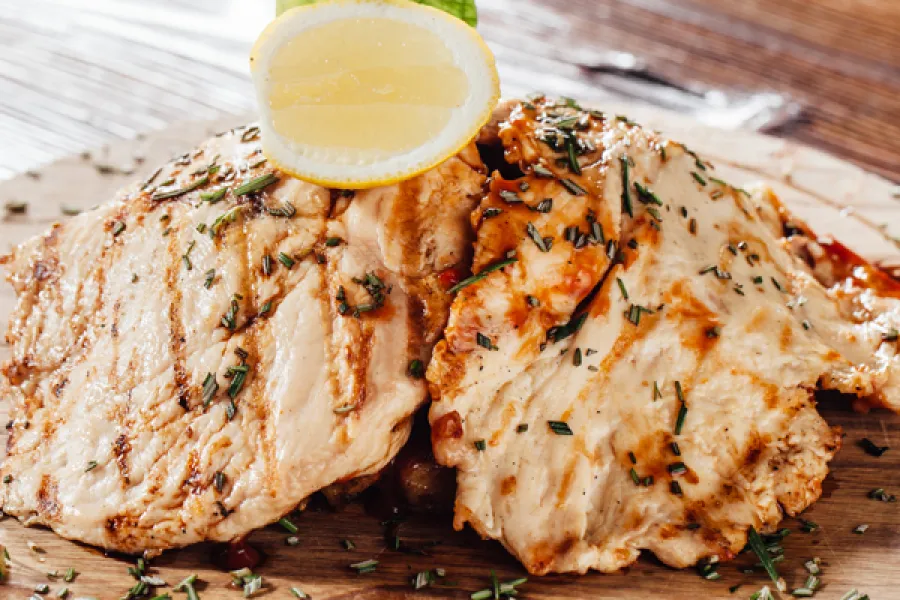 greek chicken with garden rosemary, fresh thyme and oregano herbs