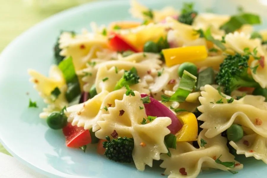 pasta primavera with garden broccoli, asparagus, bell pepper, spinach, homegrown tomatoes and fresh basil