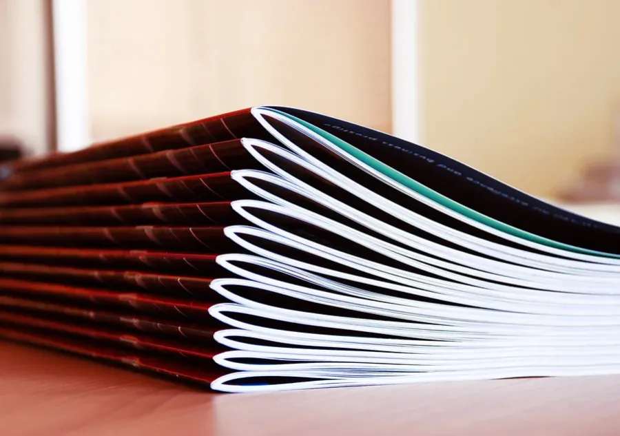 A stack of Saddle Stitched books