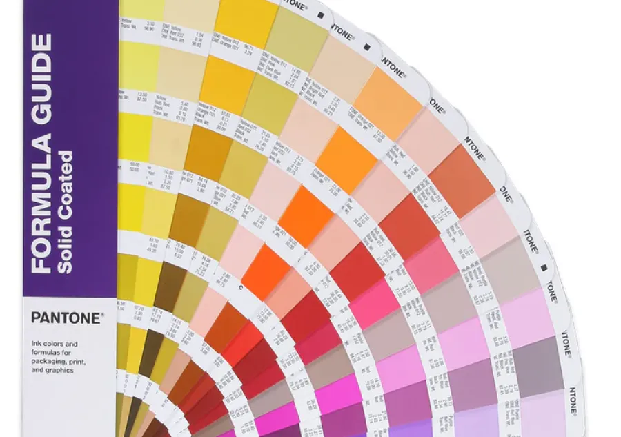 A Pantone color guide book fanned open