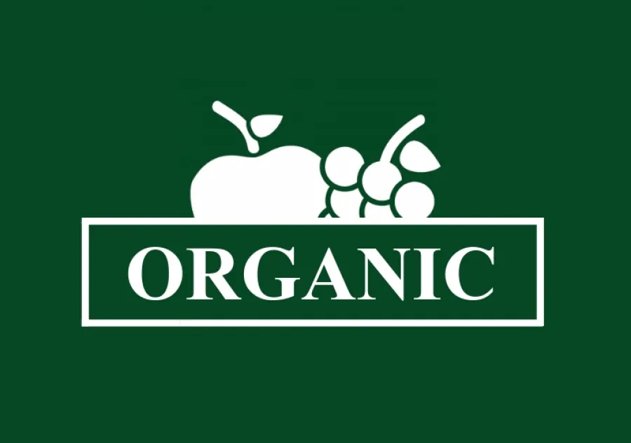 Organic food store logo printed as a reverse in green ink on white substrate