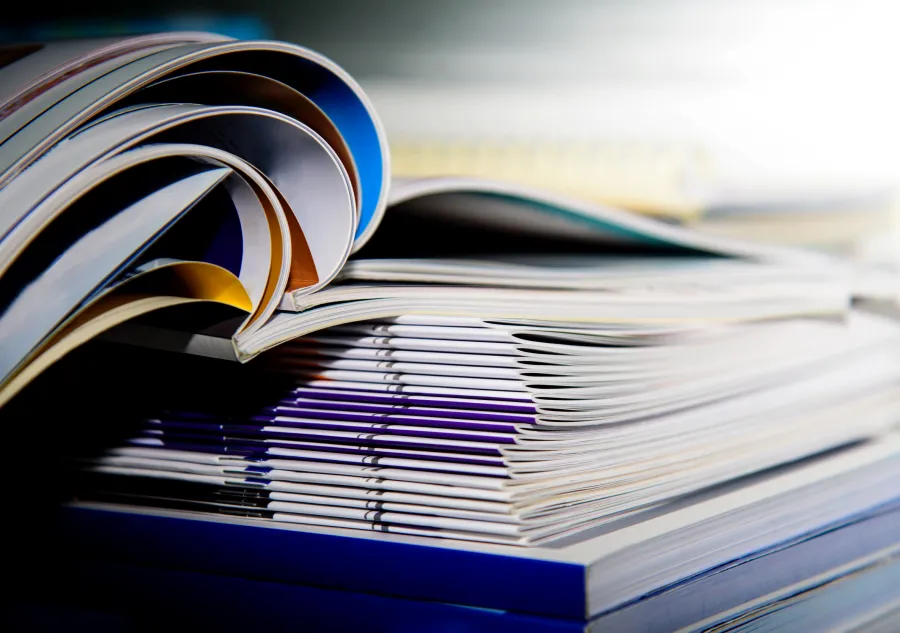 Different Book Binding Types placed in a stack