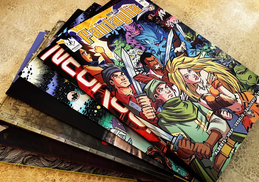 A stack of colorful Comic Books