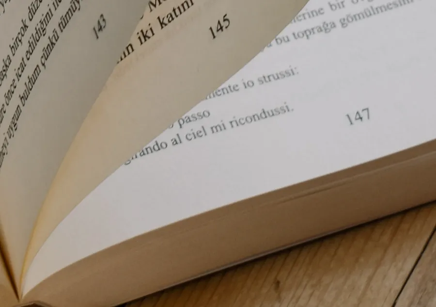 Pages of a book being flipped to show the Page Numbering