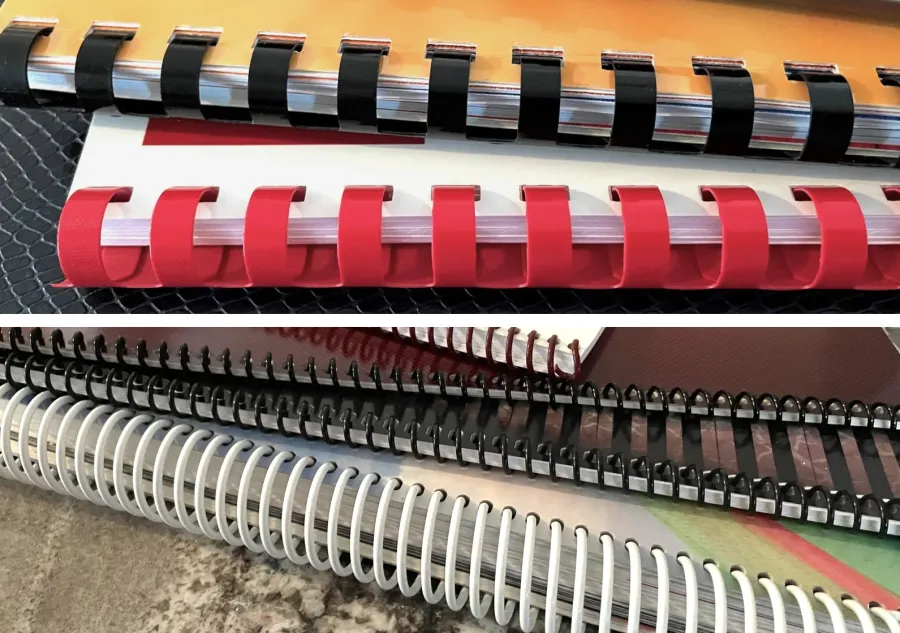 Two comb bound books pictured above four spiral bound books