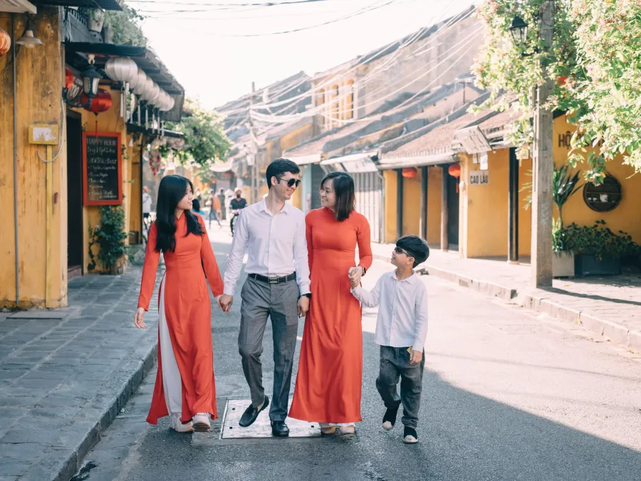 a family walking down a street