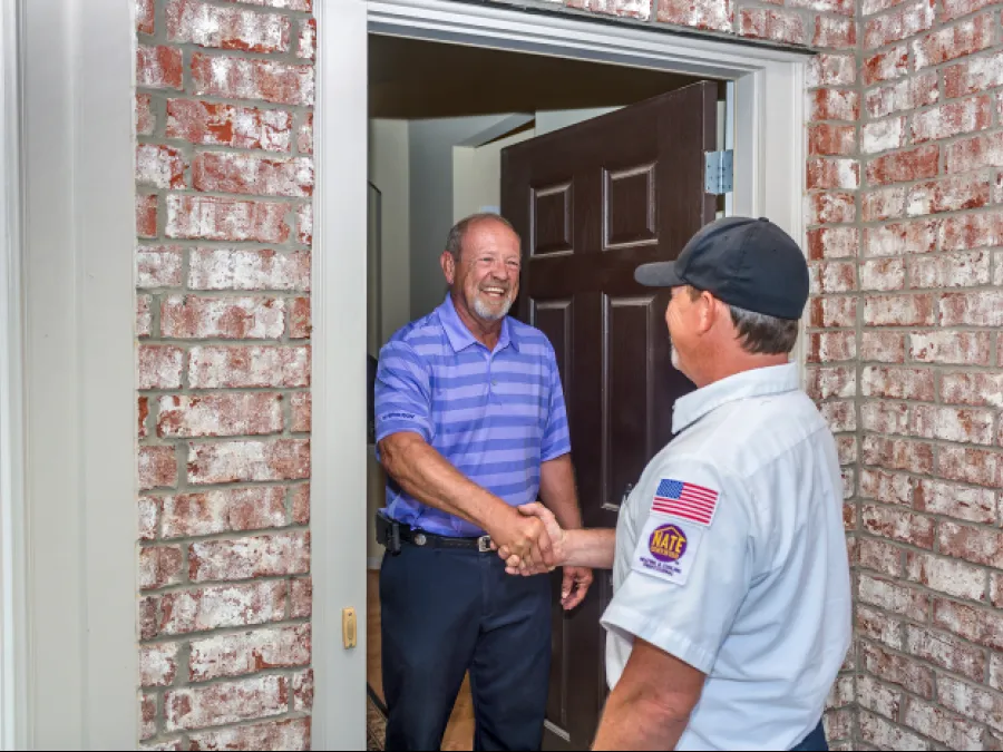 a couple of men shaking hands