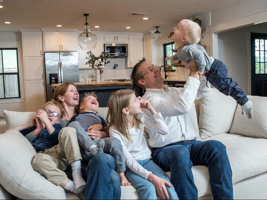 a group of people sitting on a couch