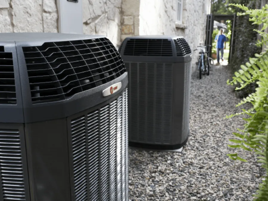 a row of black metal bins