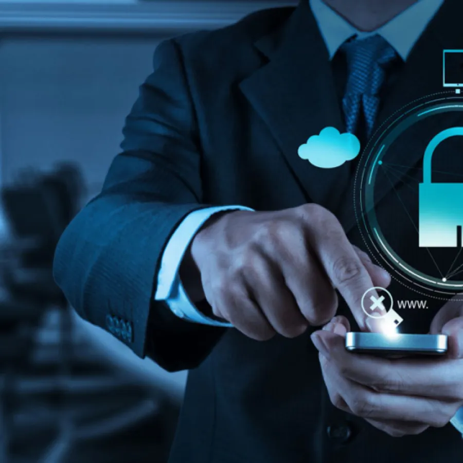 Businessman using smartphone with digital lock and security icons symbolizing mobile cybersecurity and data protection.