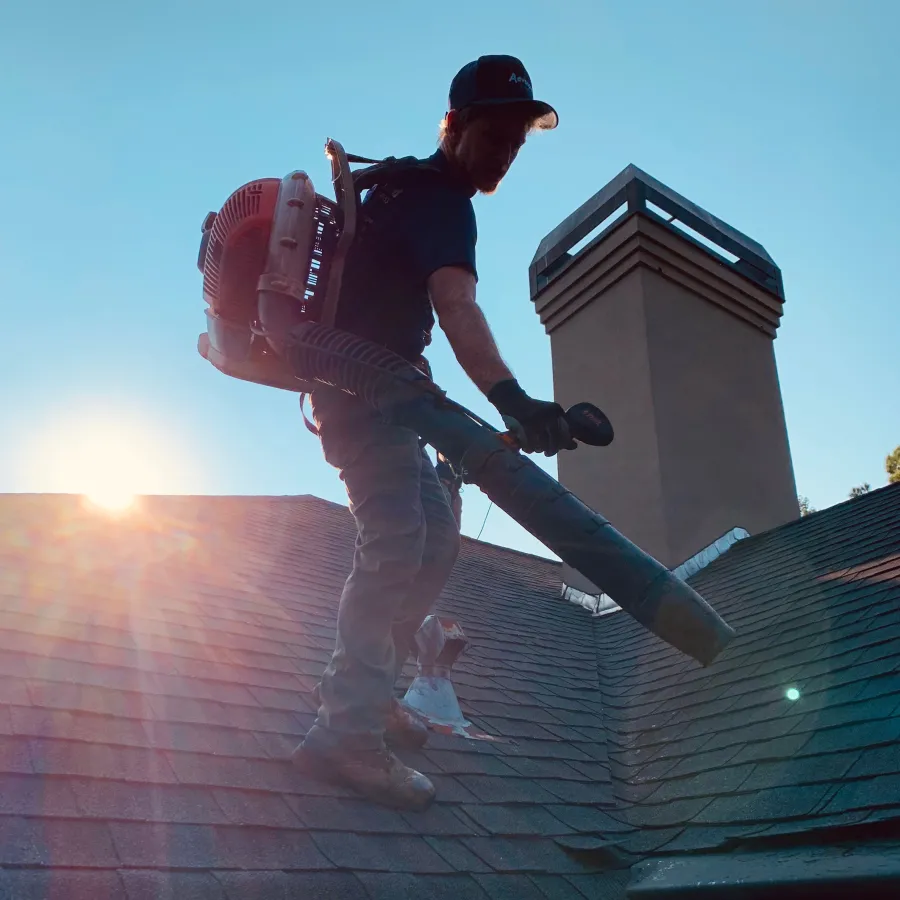 a person jumping off a roof