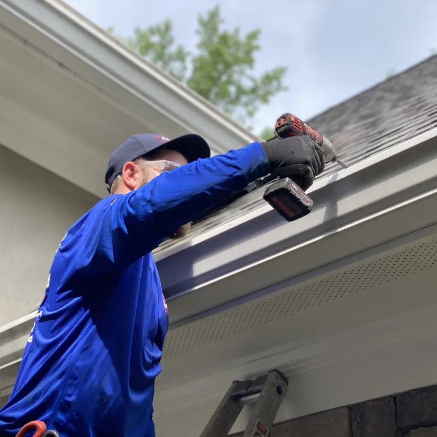 a man standing on a roof