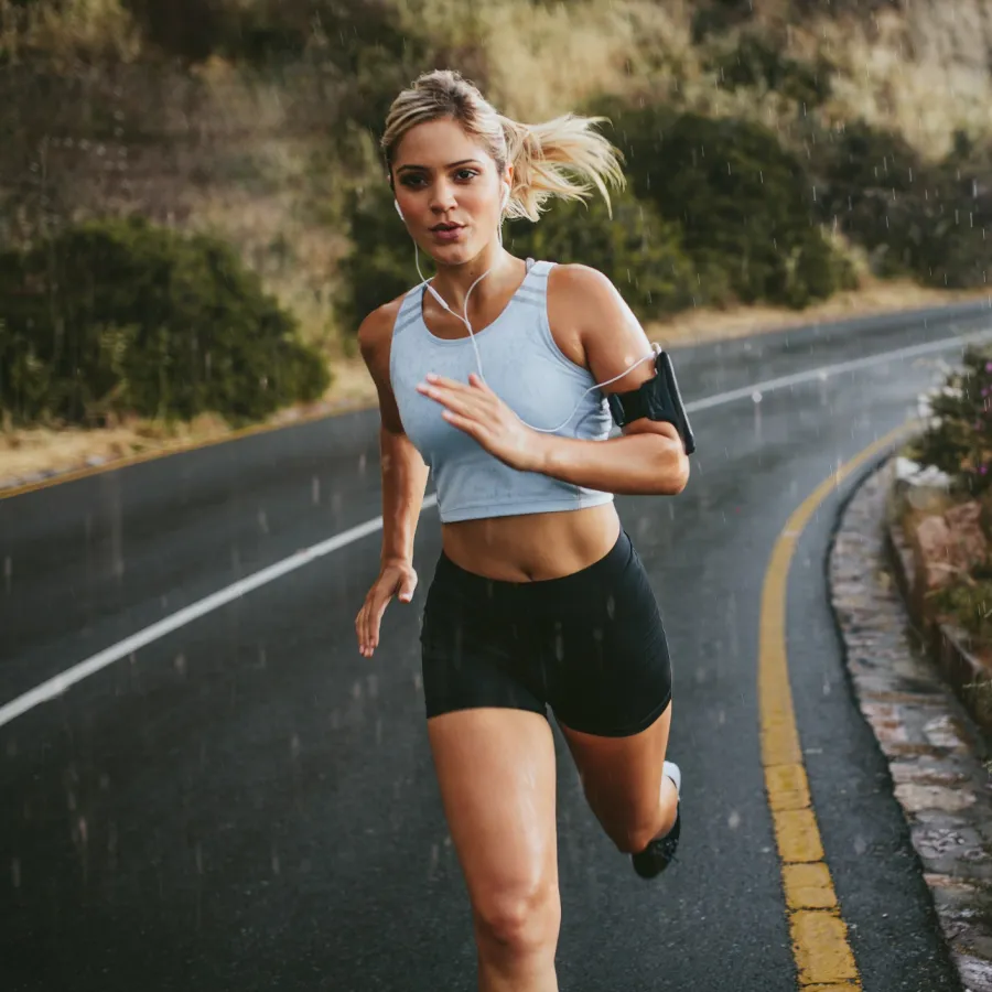 a woman running on a road