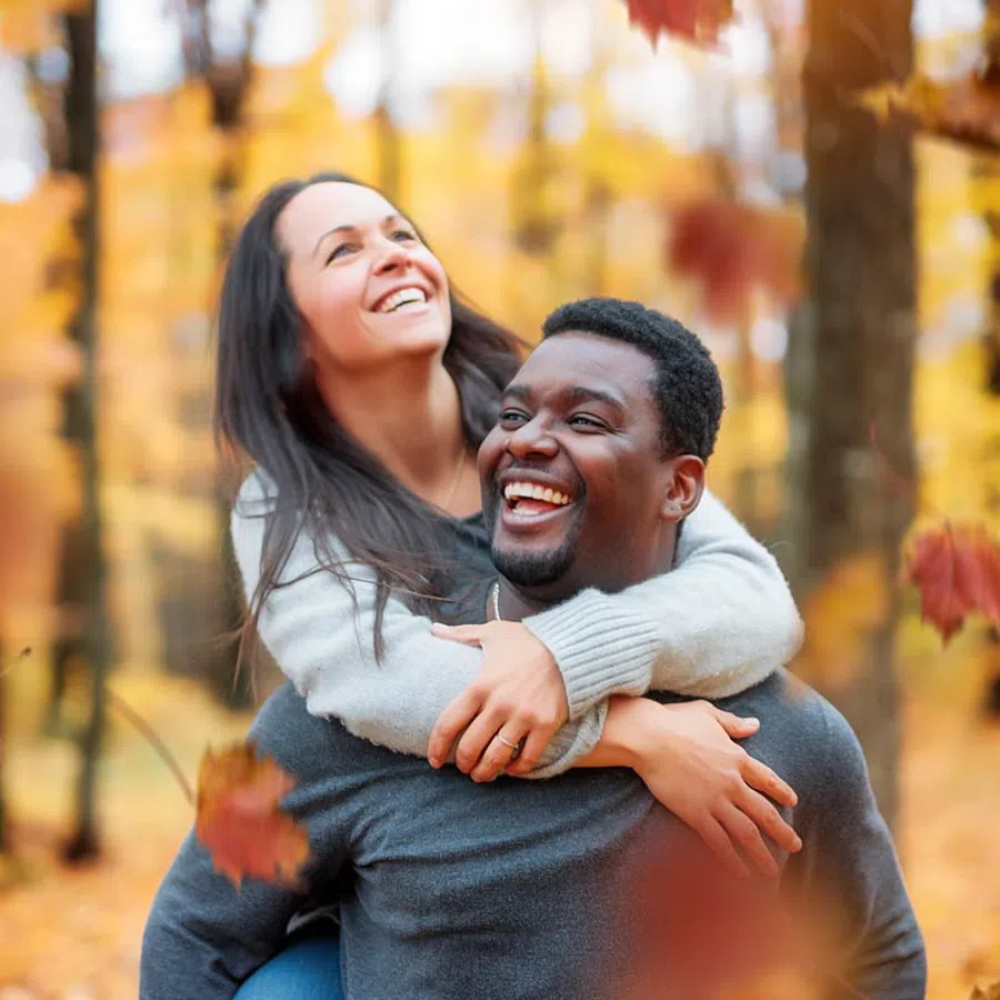 a person leaning against a tree