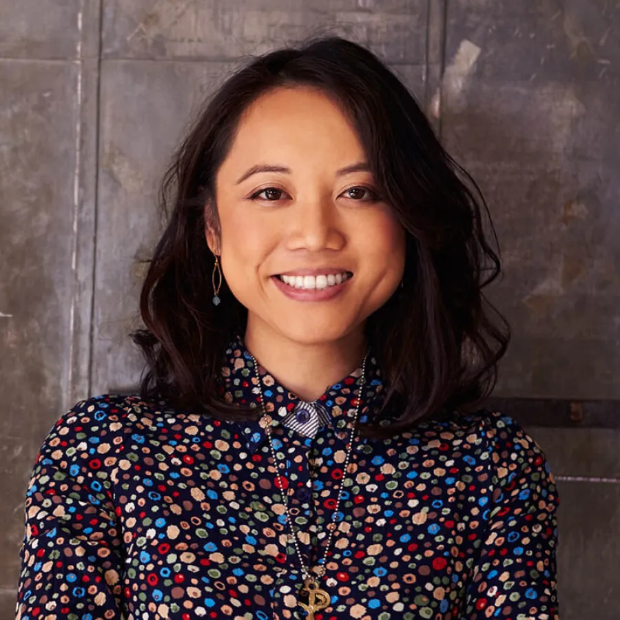 a woman smiling for the camera