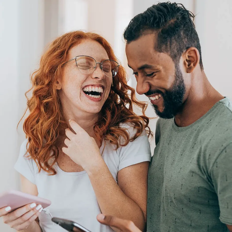 a man and a woman laughing