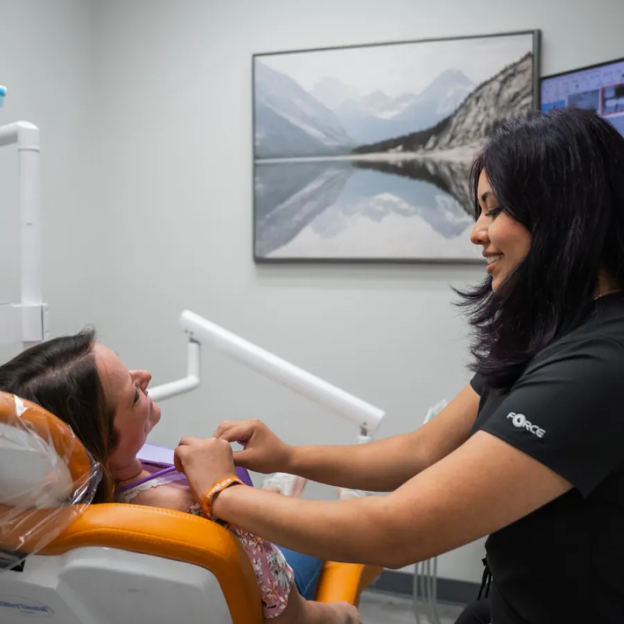 a family smiling and laughing