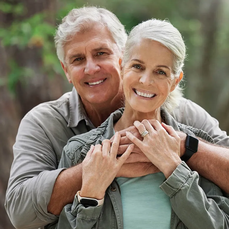 a man with his hands on his face