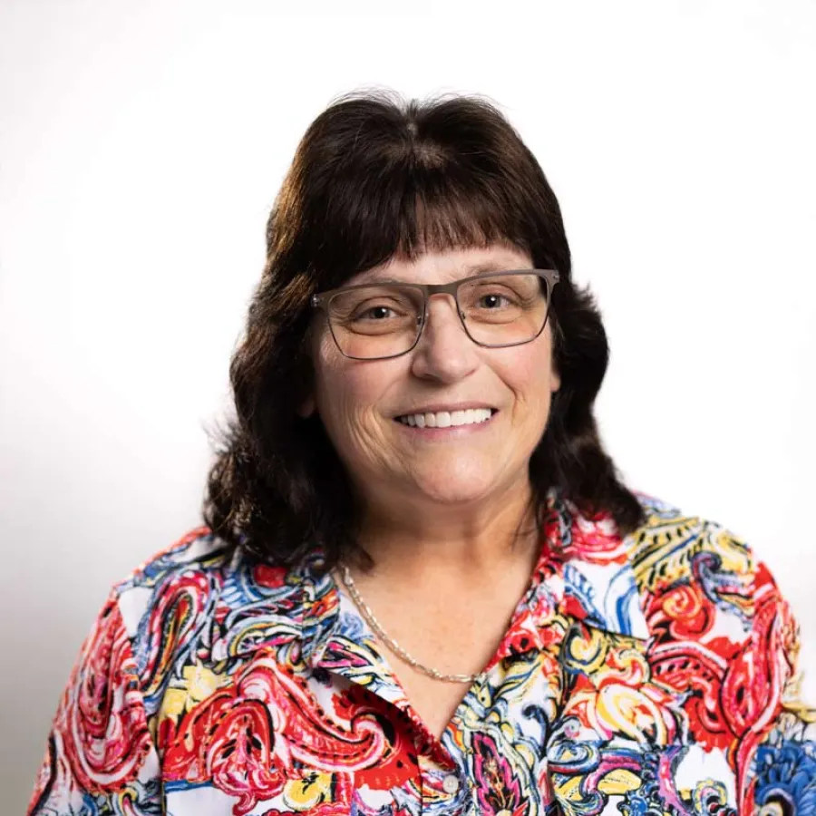 a person smiling outside