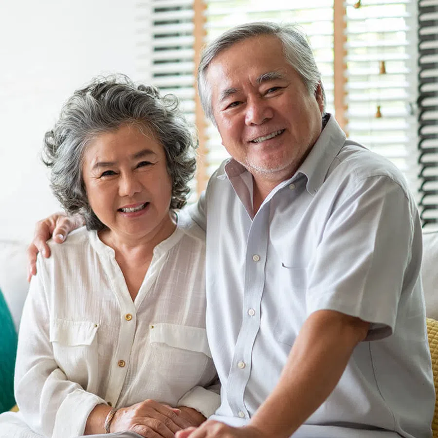 a man and a woman smiling