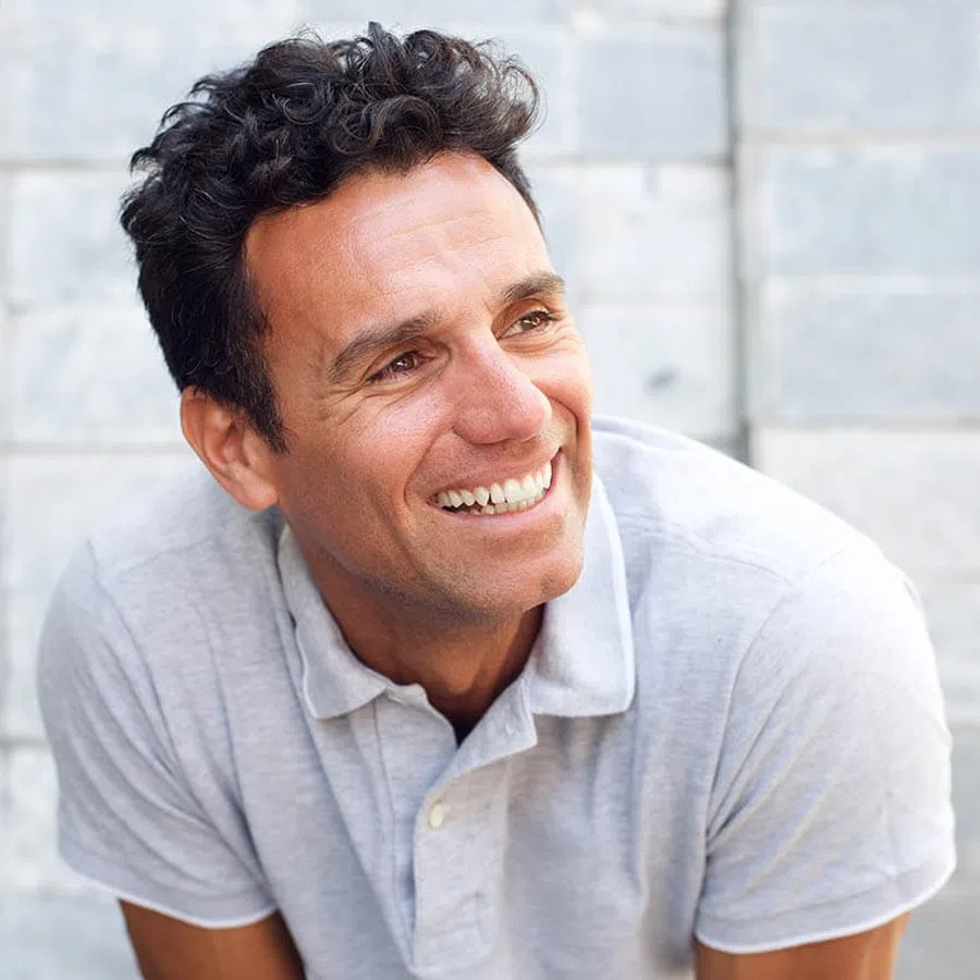 a man smiling for the camera