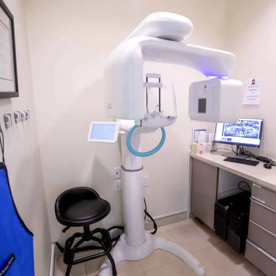a white machine with a blue light
