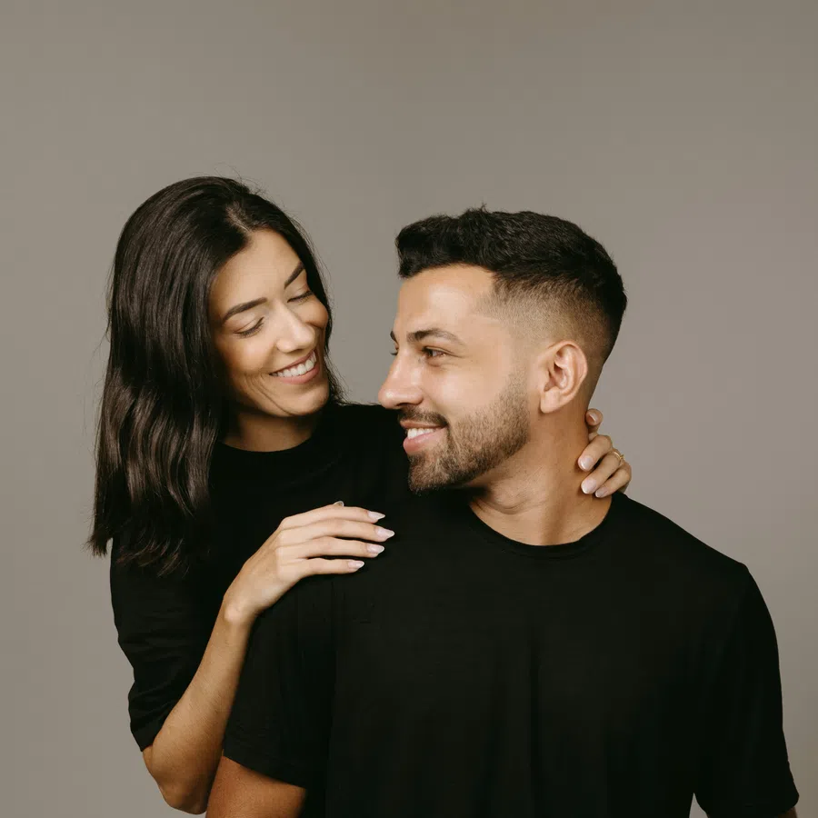 a family smiling and laughing