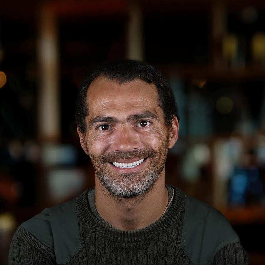 a man smiling for the camera