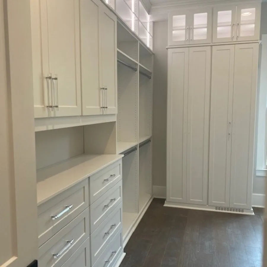 a room with white cabinets